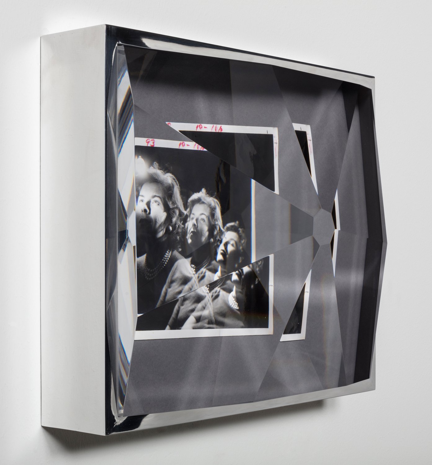 Jeremy Shaw Towards Universal Pattern Recognition (Hypnotism Houston 6- 26-60), 2018 Original archive press photograph, custom-cut prism, chrome 35 x 40.5 x 17 cm 