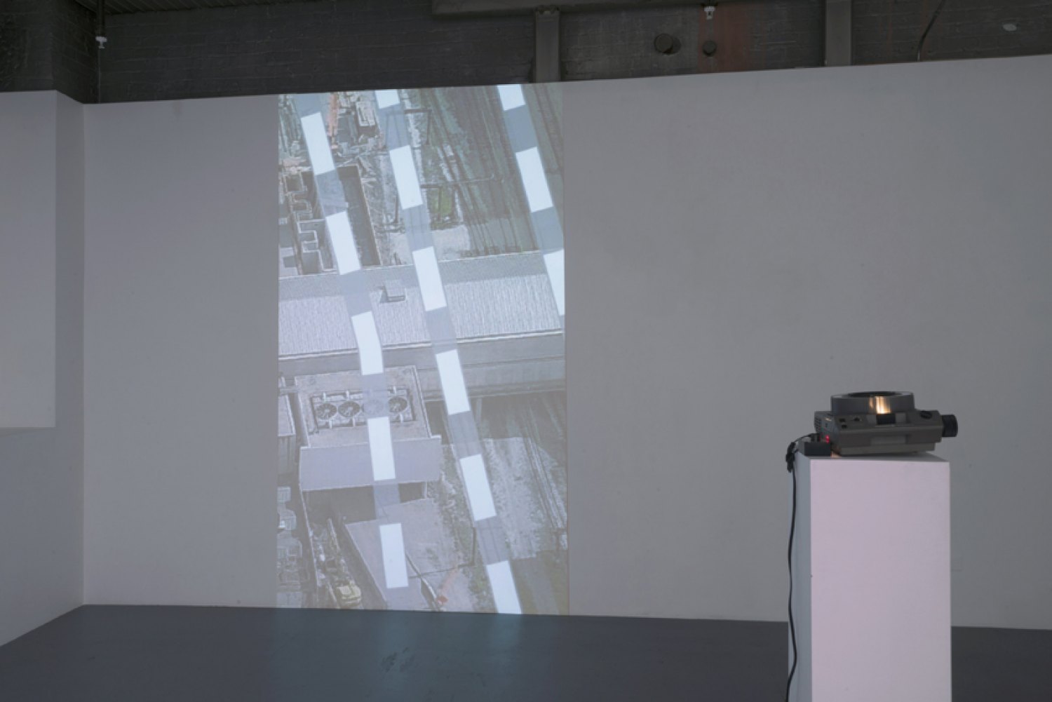 Sean Snyder Vertical Traces, 2015 16:9 format HD video, 1 mintue 20 seconds, color, no audio, projection 