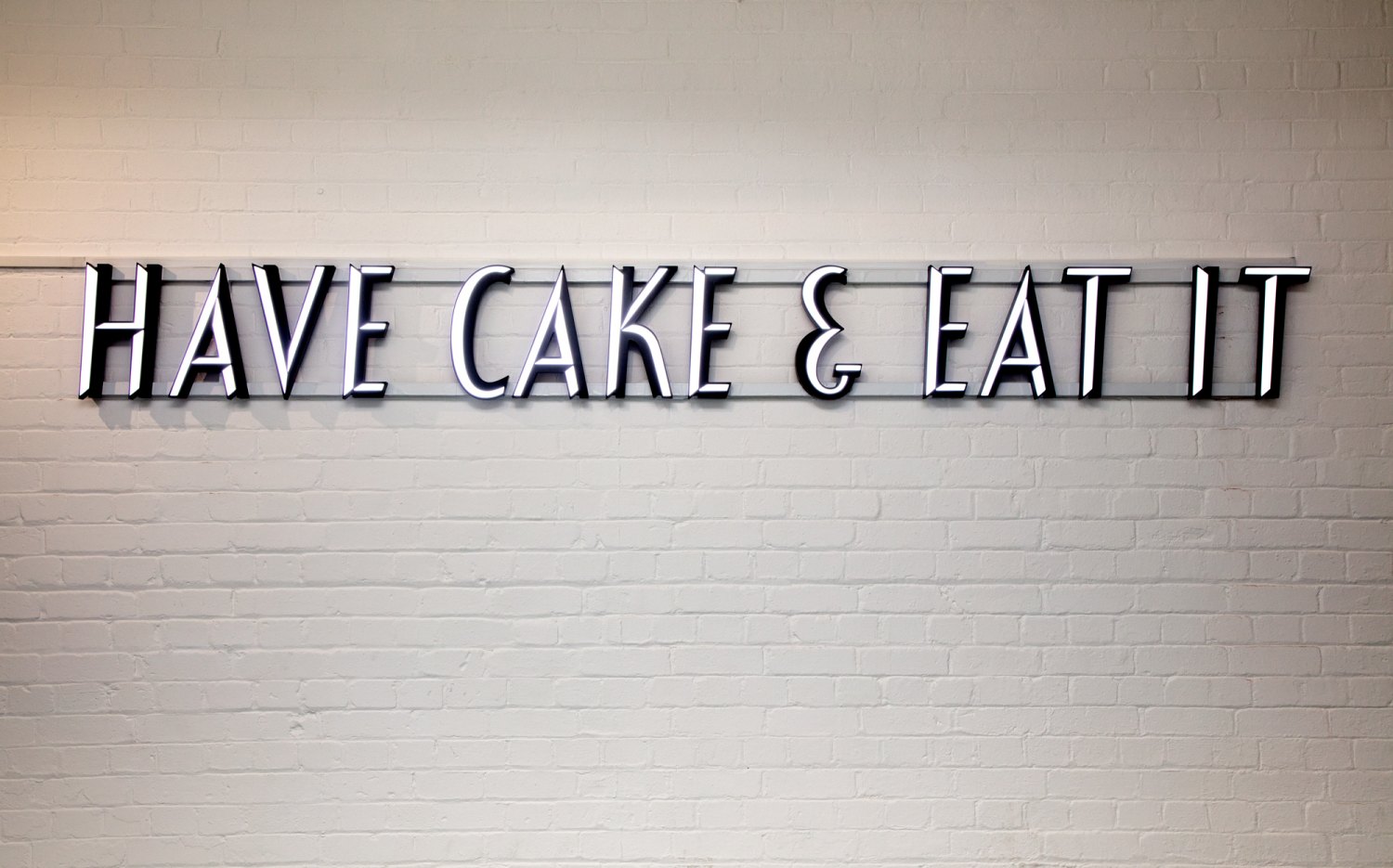 Claire Fontaine  Untitled (Have cake & eat it), 2017 LED 3d 2 tone lettering with support, 33 x 302.5 x 6 cm 