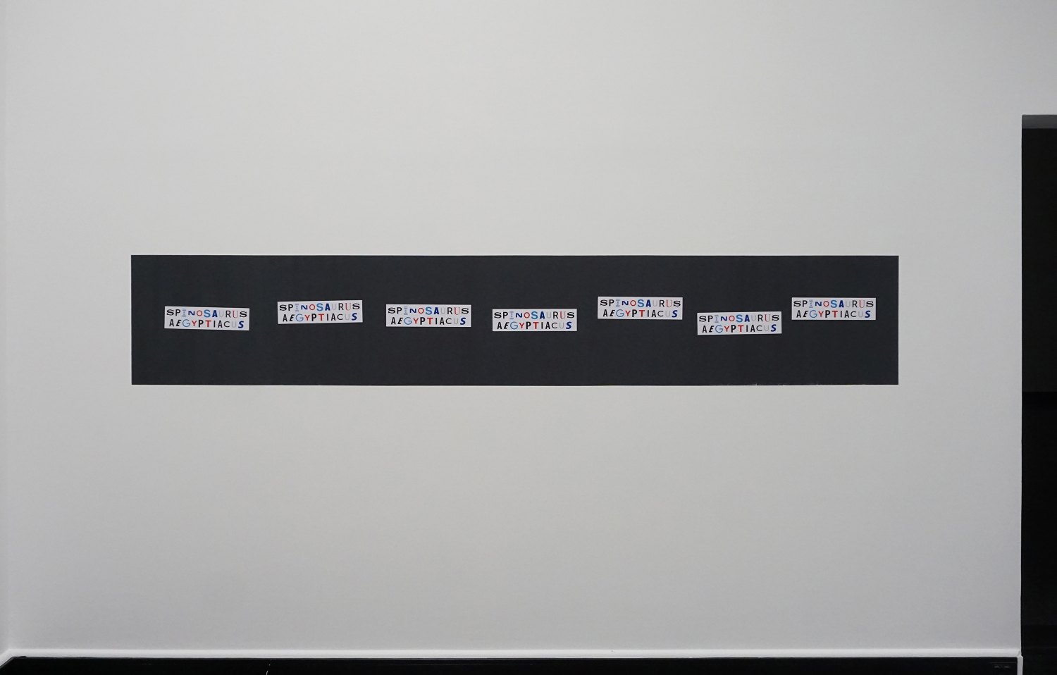 Sean Snyder Spinosaurus Aegyptiacus (Visual Identity), 2018 7 magnetic bumper stickers, 9 x 33 cm, installed on 52 x 300 cm magnetic painted wall