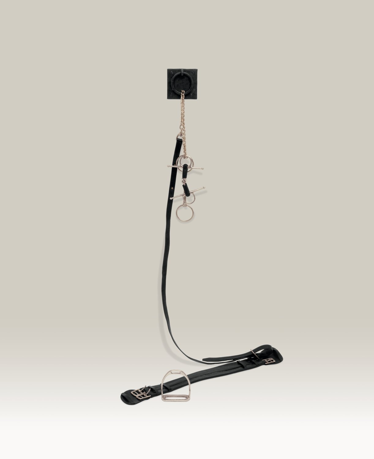 Tom Burr put down I, 2003 Iron ring, saddle girth and mixed media, dimensions variable