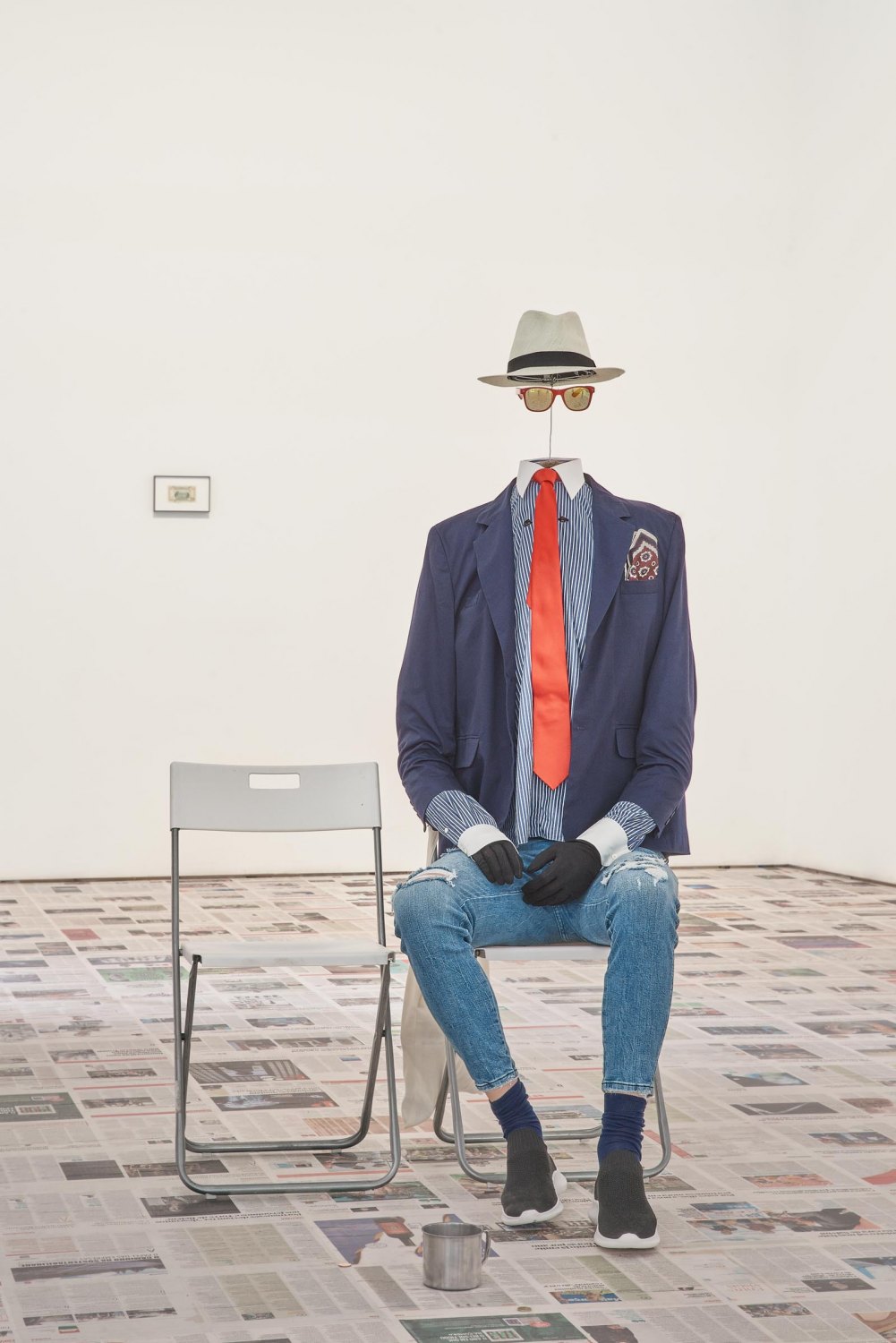 Claire Fontaine Headless Man, 2016  Mannequin, hat, sunglasses, shirt, suit jacket, tie, gloves, jeans, socks, shoes, padding, wire  