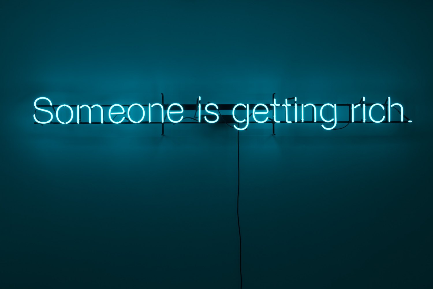 Claire Fontaine  Untitled (Someone is getting rich), 2012 Tecnolux No.9 Super Turquoise, 10mm glass, back painted, wall, window or ceiling mounted, 15 x 223 x 4 cm 