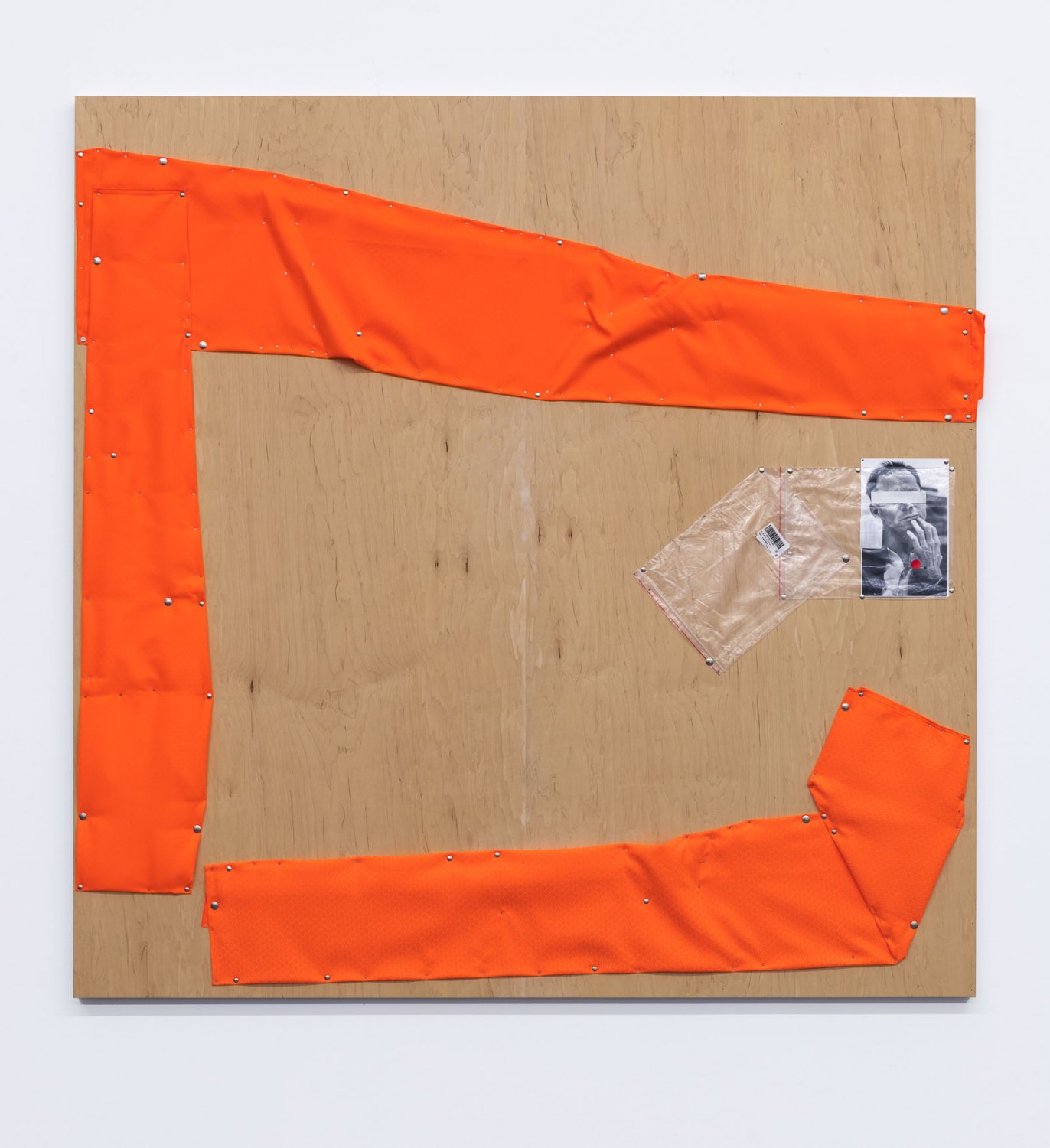 Tom BurrAtlas II, 2022Plywood and aluminium panel, black and white photographs, safety orangefabric, plastic sleeves, steel push pins, tacks183 x 183 x 3,5 cm