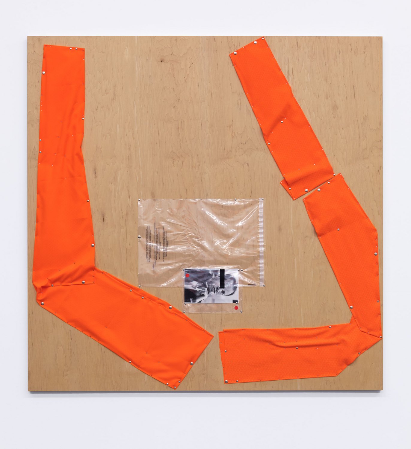 Tom BurrAtlas III, 2022Plywood and aluminium panel, black and white photographs, safety orangefabric, plastic sleeves, steel push pins, tacks183 x 183 x 3,5 cm