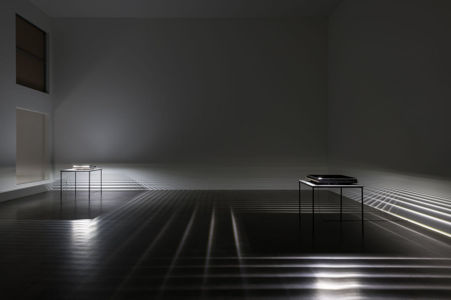 Kitty Kraus, Untitled, 2022, 4 elements; cooling fan, microphone,  mobile amplifier; 3 x aluminum, mirror,  LED, cable, wood, tape and table
