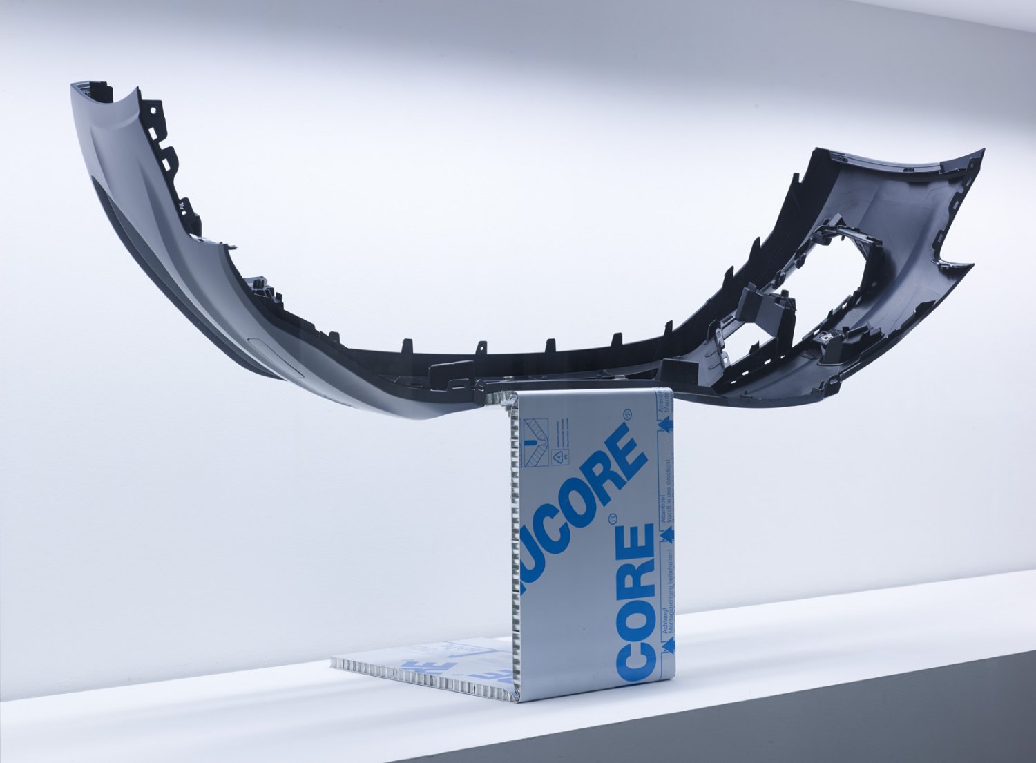Yngve Holen  ECONOMY CLASS LEGS, 2014  Printed window sticker, car bumper. Alucore, bolts, video, laser engraved LCd screen, USB-stick, articulaing wall mount, dimensions variable, Detail  