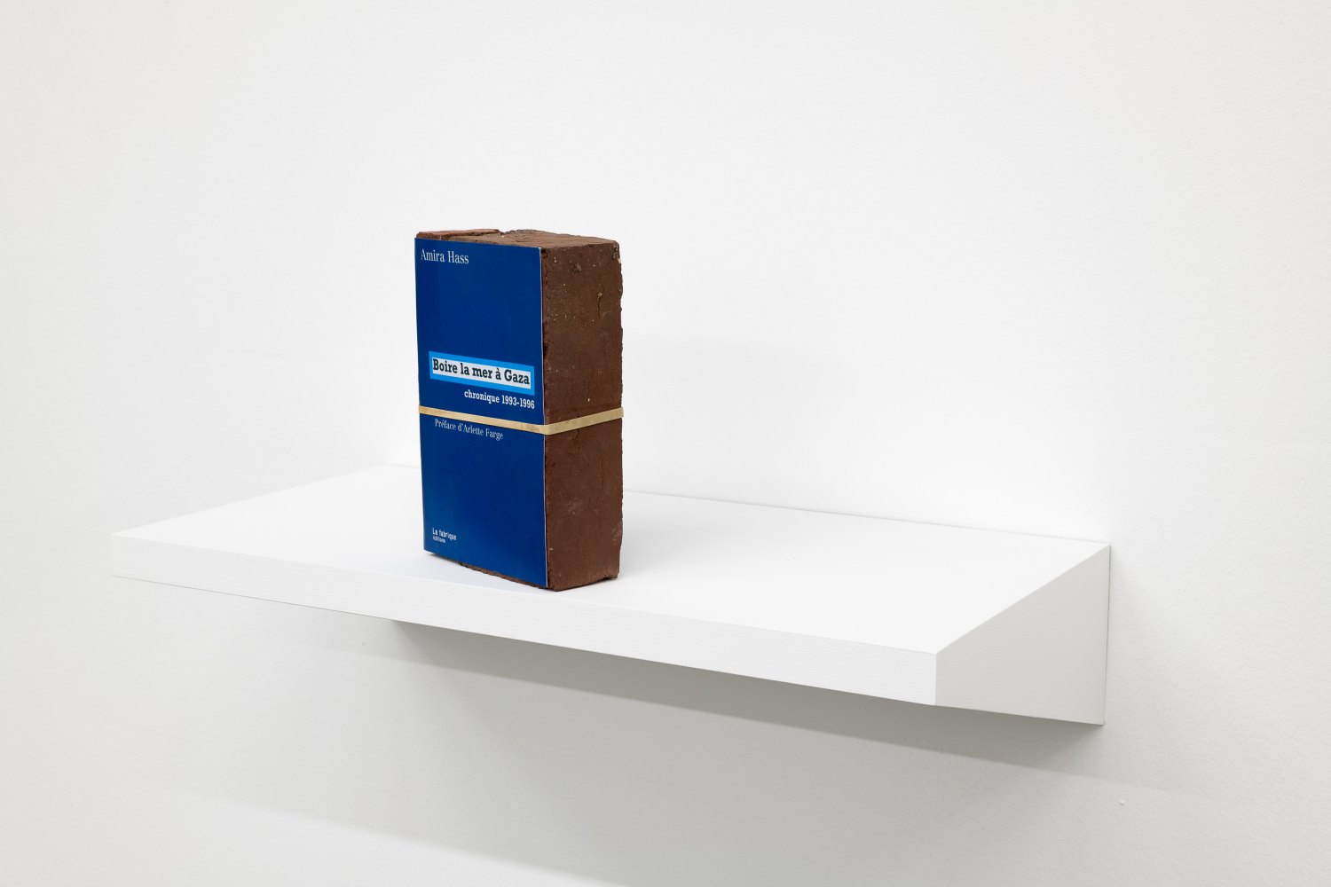 Claire Fontaine Boire la mer à Gaza brickbat, 2007 Brick, brick fragments and digital archival printwith optional elastic band 20 x 13.2 x 5.8 cm