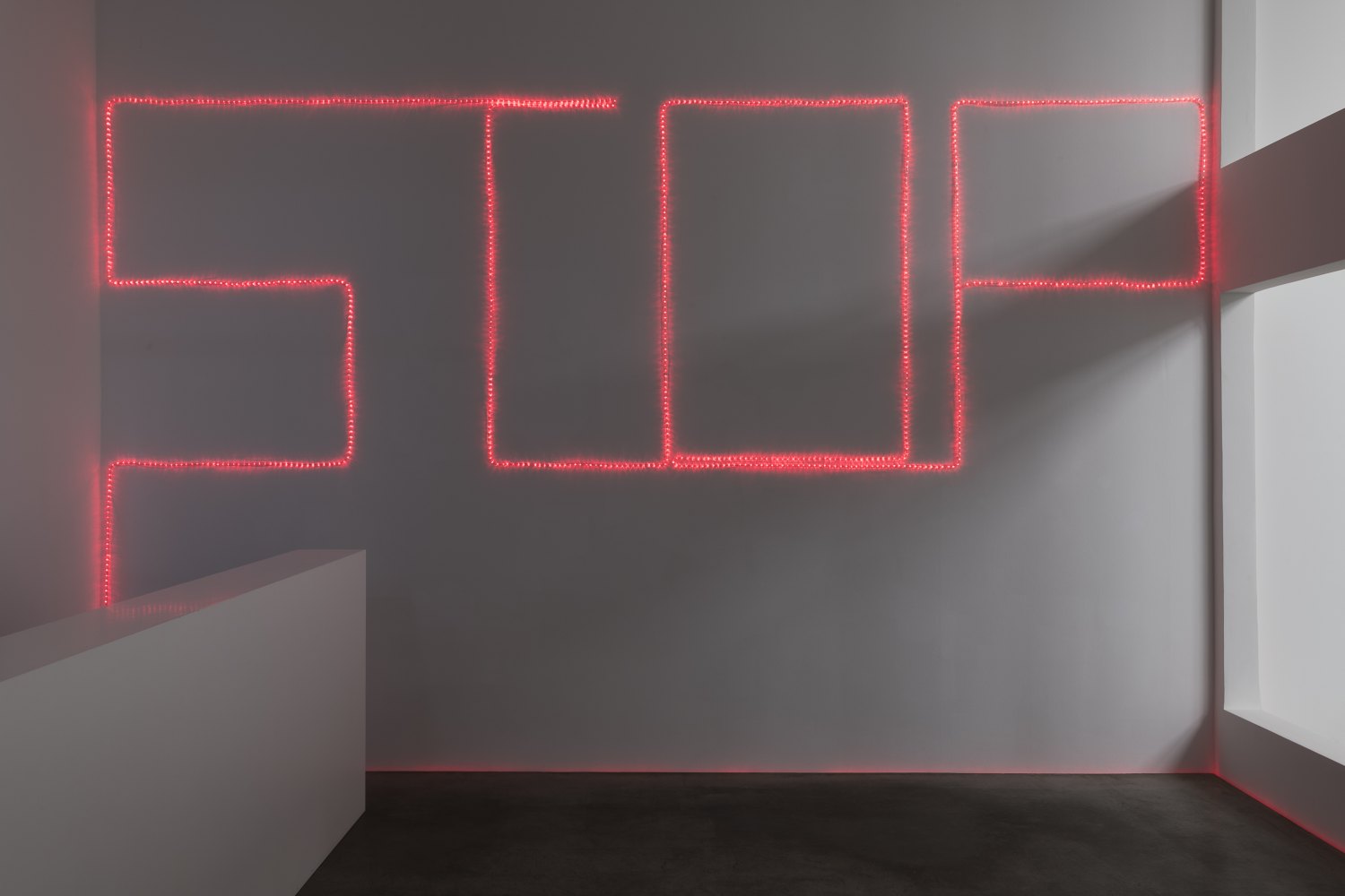 Claire Fontaine STOP, 2023 Red rope lighting, clips, cable ties and cabling 200 x 600 cm up to 400 x 1200 cm 