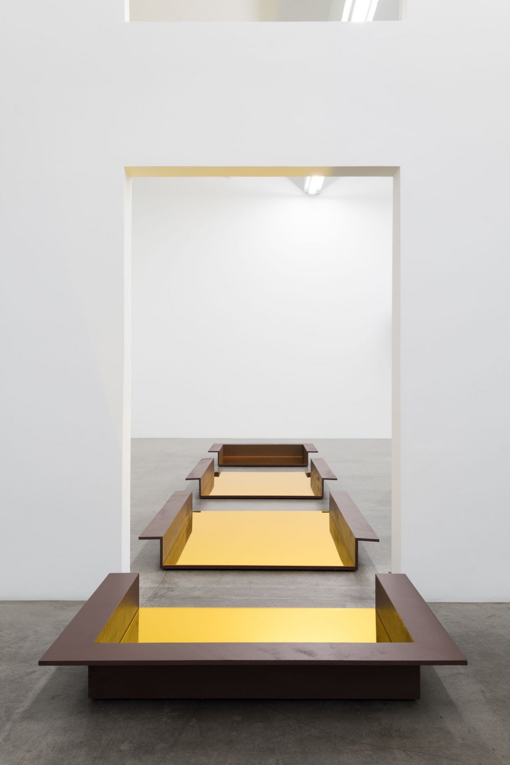 Tom Burr Piscine, 2002 Wood, mirror plexiglas, yellow plexiglas, paint 23 x 740 x 153 cm (4 parts; 2 each 21 x 153 x 100cm; 2 each 21 x 153 160 cm)