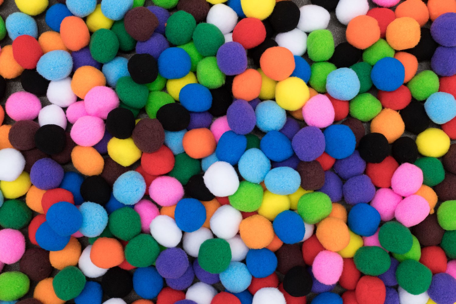 decentralized portrait selves, 2025 (details) one pompom for each day I’ve been alive up until the display of,  2 inch Pom Pom balls (12.901) dimensions variable