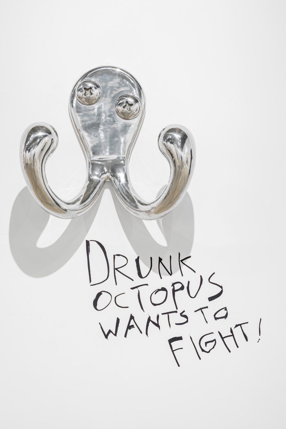 Drunk Octopus wants to fight, 2025 Polished aluminum, wall painting 65 x 60 x 32 cm
