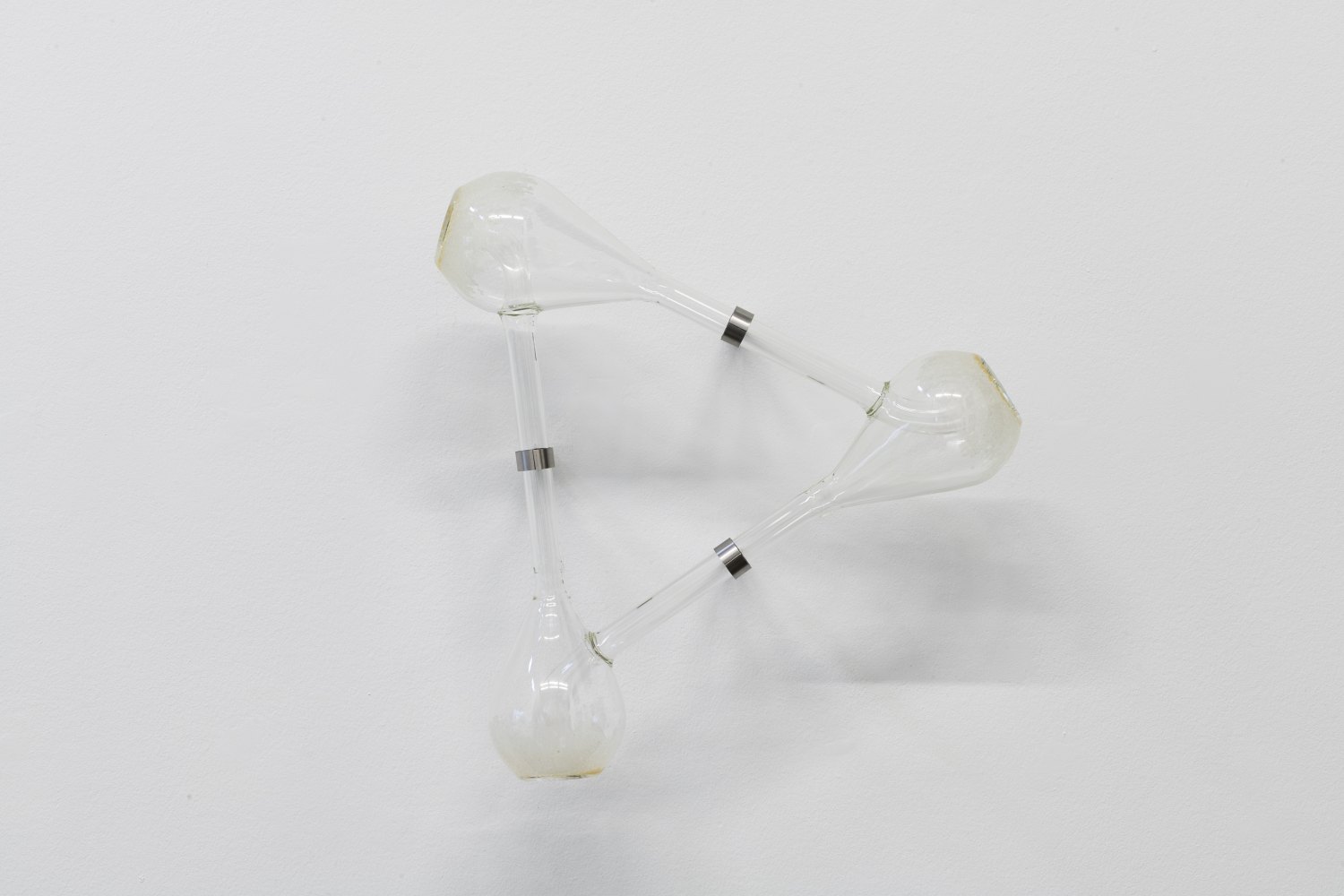Jeremy Shaw The Distance Between Infinite Folds is Still You, 2026 Flame-worked Borosilicate glass, vaporized freebase dimethyltrypamine (DMT) residue, stainless steel 44 x 43.5 x 20 cm
