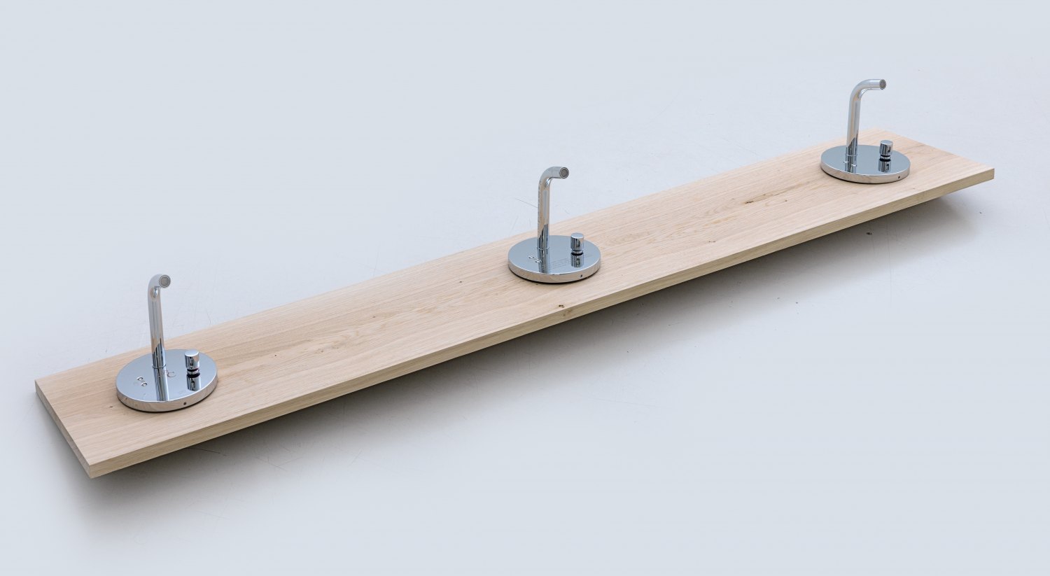 Bernadette Corporation sexy as fk (Trébuchet), 2010 3 Dornbracht emote wall-mounted infrared basin mixer with mixing button with 2 sandblast etchings and 1 hand engraving, 18 × 160 × 25 cm