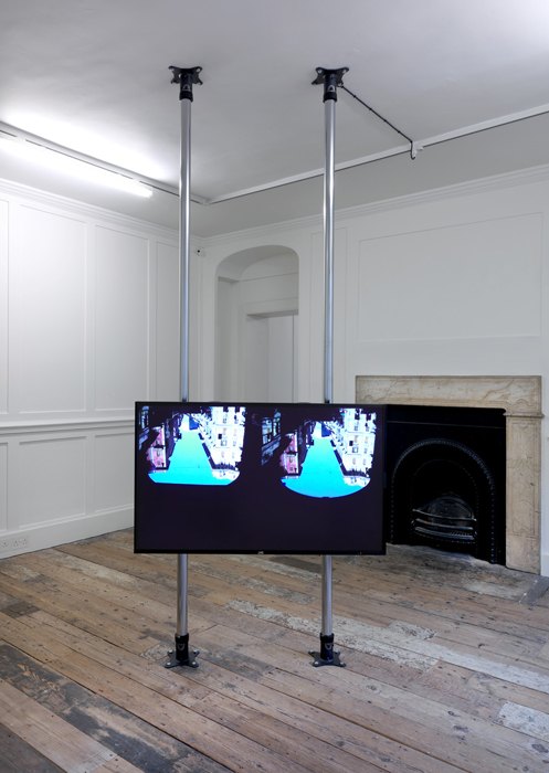 Hilary Lloyd   Tunnel, 2010  JVC LCD 47 inch monitor, Western Digital HD Player, Unicol two column mount, dimensions variable