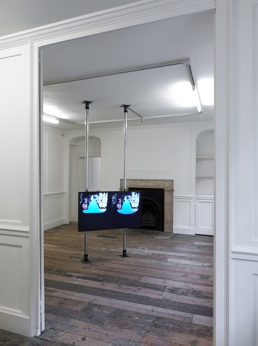 Hilary Lloyd   Tunnel, 2010  JVC LCD 47 inch monitor, Western Digital HD Player, Unicol two column mount, dimensions variable