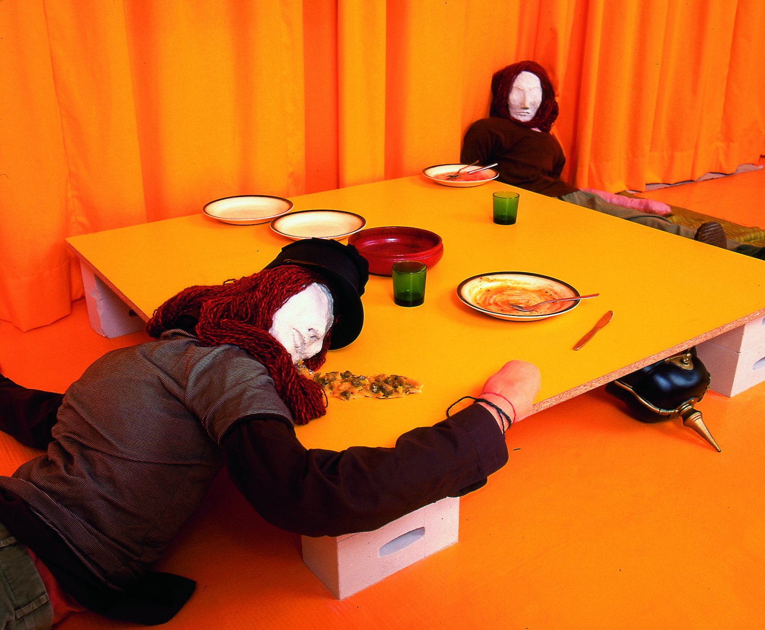 Kai Althoff REFLUX LUX, 1998 Two lifesize figures, table, plates, different jars, TV, video tape, cassette recorder, curtain, bar stool, clothes, 8 bubblejets, drawings, dimensions variable 