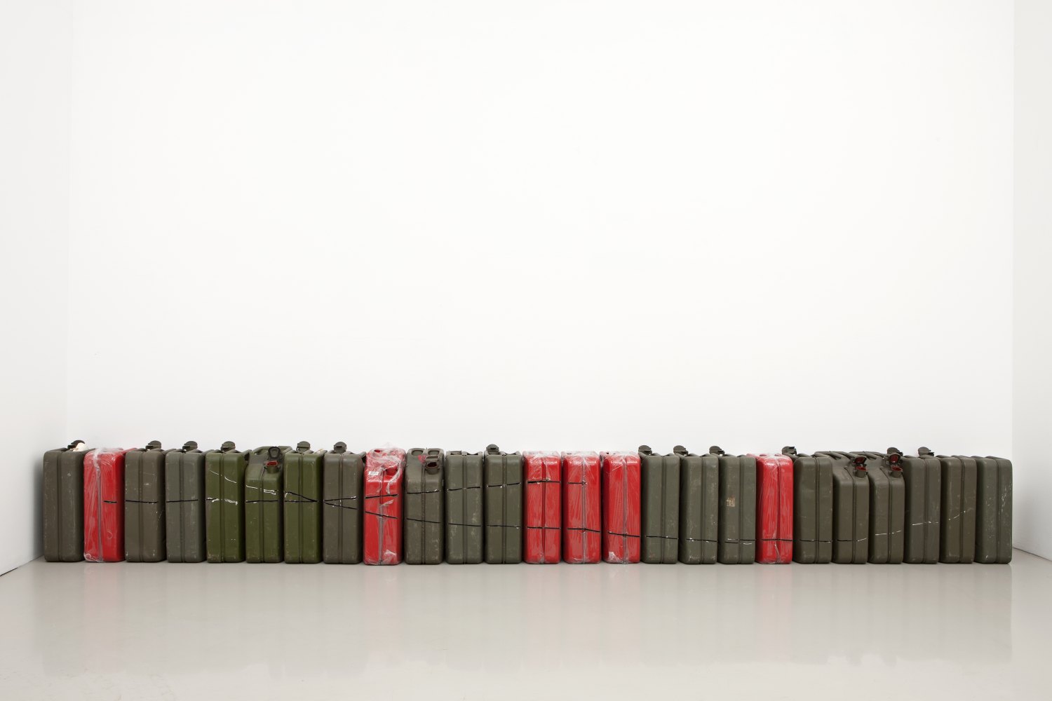 Matias Faldbakken Untitled (JERRY CAN CUT #2), 2013 25 steel jerry cans, plastic, 47 × 34.5 × 17 cm each